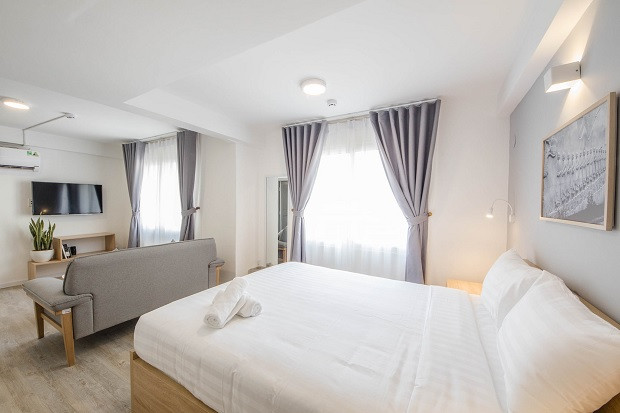 Phòng ngủ tiện nghi tại Common Inn Thao Dien