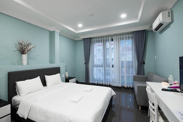 Phòng ngủ tiện nghi tại New Milano Hotel