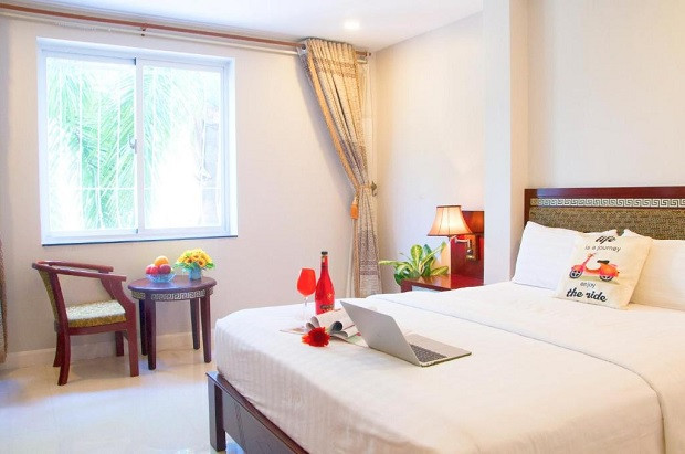 Phòng ngủ rộng rãi tại Sunshine Boutique Hotel