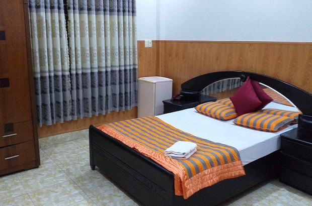 Không gian phòng ngủ tại Tân Phượng Vũ Hotel