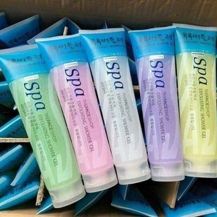 Hình ảnh một lọ kem tẩy da chết spa màu trắng hương sữa