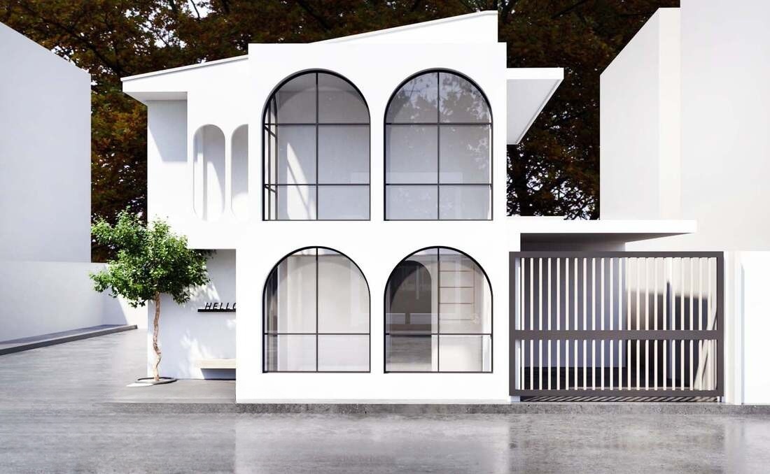 Mặt tiền spa với tông màu trắng chủ đạo và thiết kế hình khối đơn giản