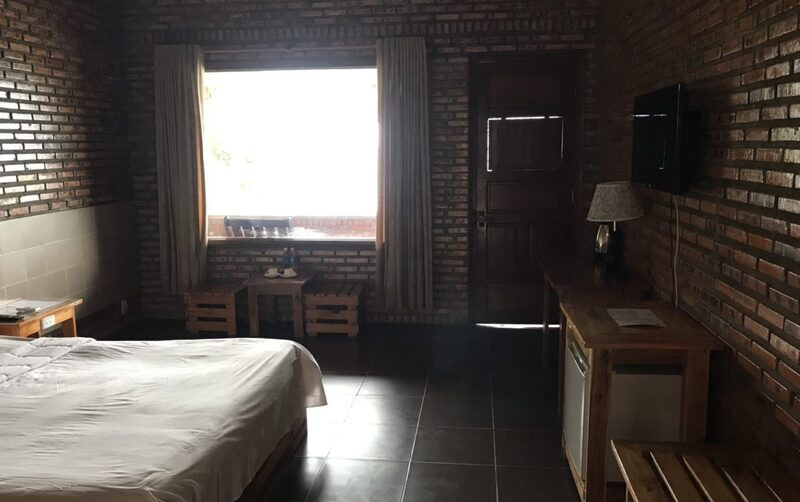 Phòng Double Garden View tại Wild Beach Resort &amp; Spa Nha Trang với ban công xanh mát