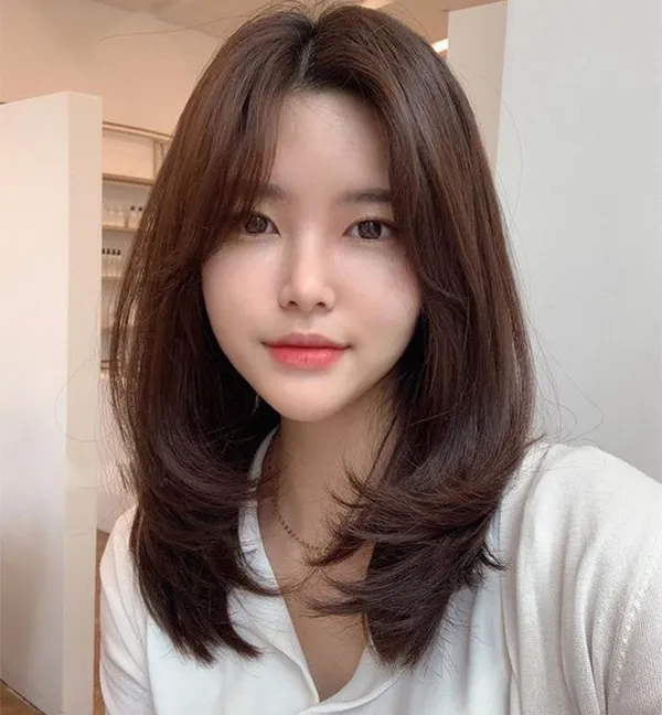 Kiểu tóc layer nữ mái bay tạo độ dày và bồng bềnh