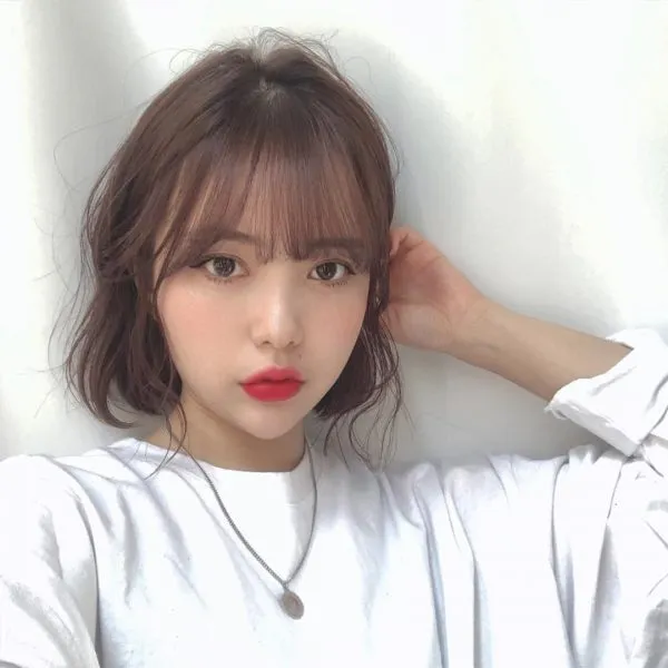 Bí quyết dưỡng tóc mái thẳng không bị xoăn từ bước gội đầu