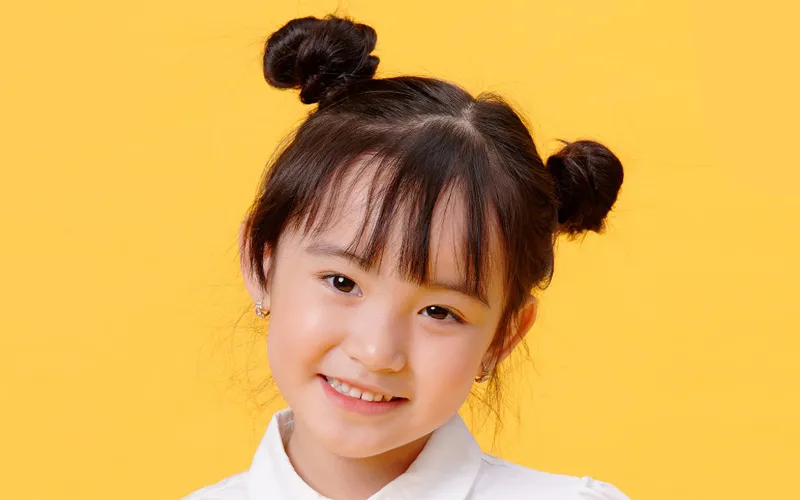 Hướng dẫn chi tiết cách làm búi tóc đẹp đơn giản cho học sinh, kiểu búi cao hai bên năng động