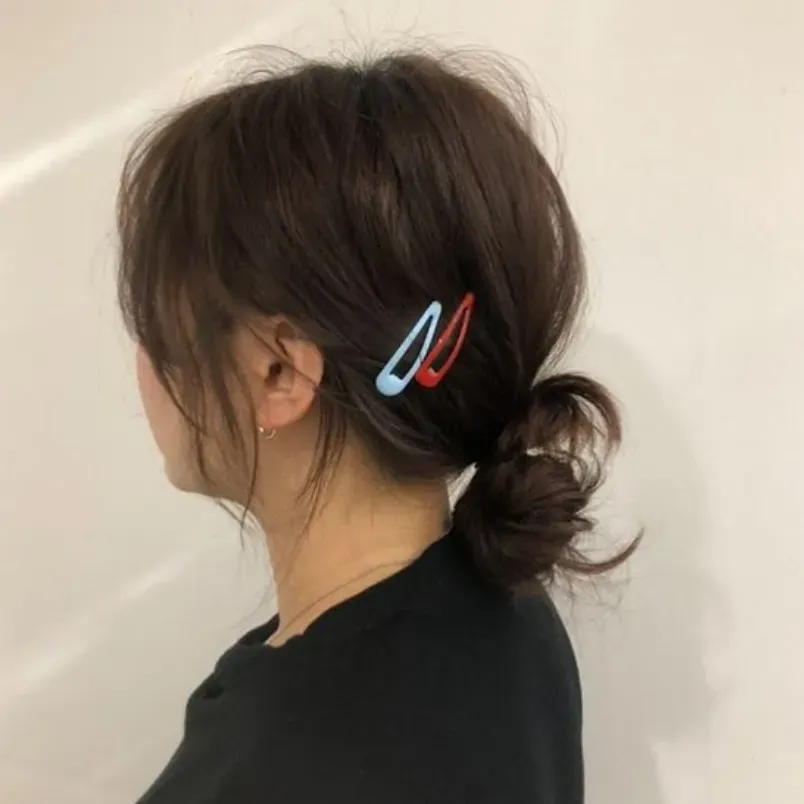 Hình ảnh búi tóc ngắn ngang vai kiểu búi thấp thanh lịch, lấy cảm hứng từ phong cách Hàn Quốc