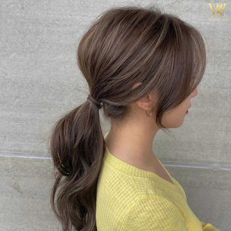 cách cột tóc duỗi: Cột tóc nửa đầu hình nơ thấp duyên dáng