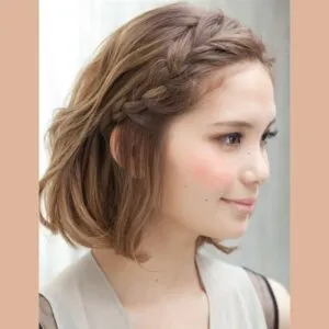 Mẹo làm tóc mái dày bằng cách tết bím tóc mái