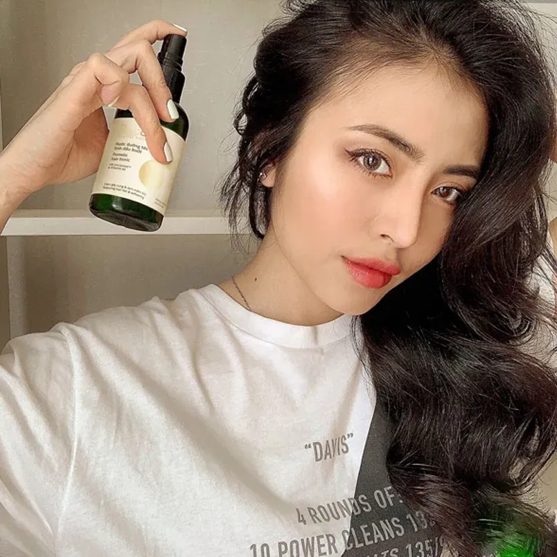 sử dụng tinh dầu bưởi để kích thích chân tóc mọc nhanh tại nhà an toàn