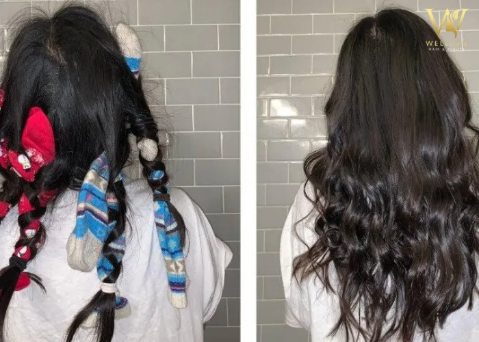 Cô gái đang cuộn tóc ẩm nhẹ quanh một chiếc tất dày để chuẩn bị cho quá trình làm xoăn không nhiệt