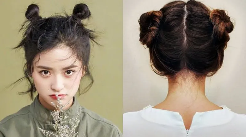 Cô gái với mái tóc ngắn được búi củ tỏi đôi cao hai bên đầu, thể hiện phong cách trẻ trung, năng động