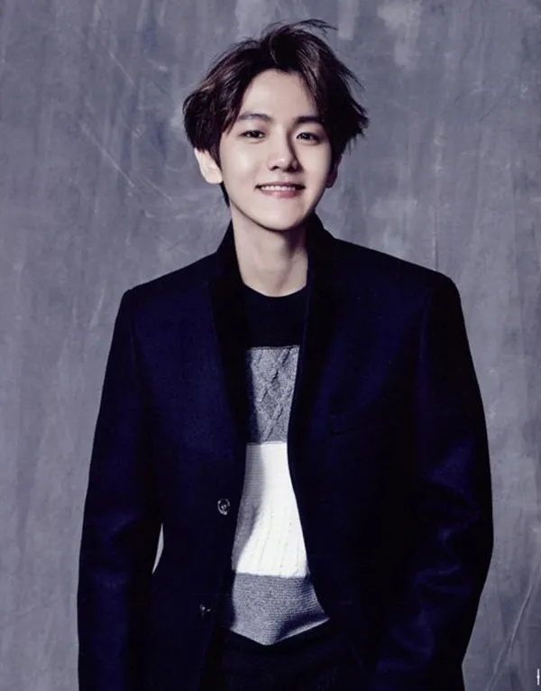 Tóc layer rẽ ngôi giữa cho nam giúp khuôn mặt hài hòa, cân đối và thu hút ánh nhìn