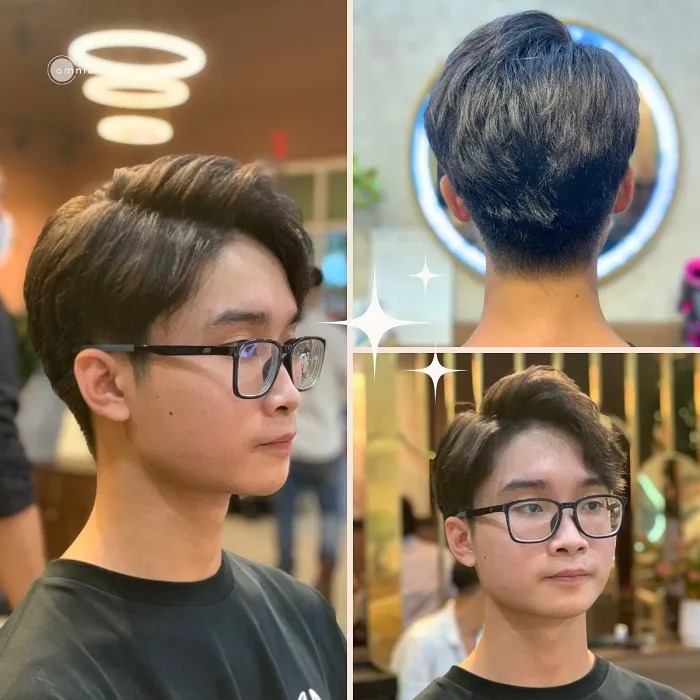 Người phụ nữ đang nhẹ nhàng massage da đầu khi chăm sóc tóc nhuộm xanh đen bằng sản phẩm hữu cơ chuyên biệt