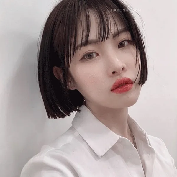 Tóc uốn gợn sóng nhẹ nhàng là cách để tóc cho mặt dài hiệu quả